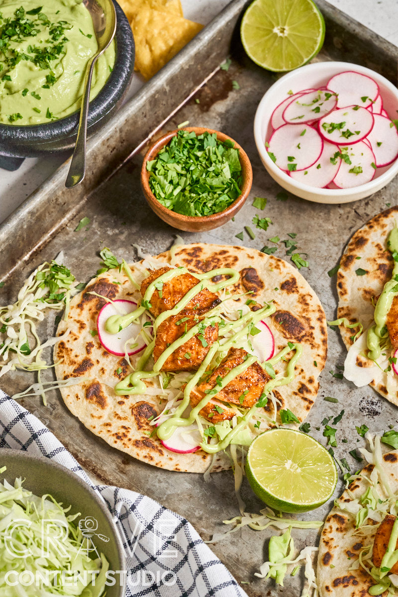 Air Fryer Chipotle Salmon Tacos with Avocado Crema