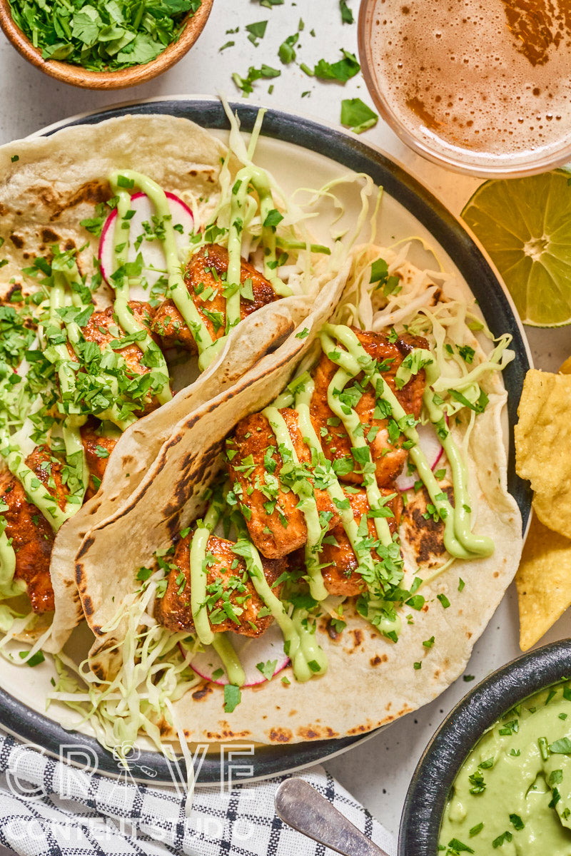 Air Fryer Chipotle Salmon Tacos with Avocado Crema