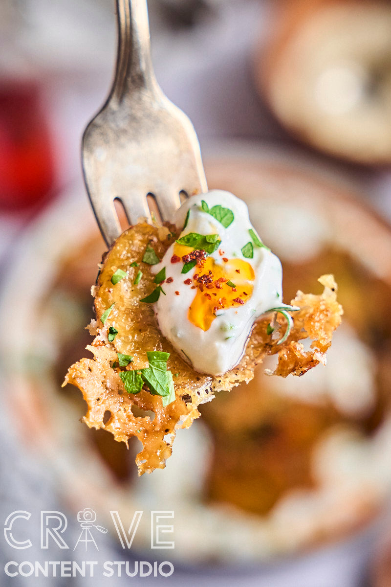 Crispy Parmesan Potatoes with Herby Yogurt and Chili Oil