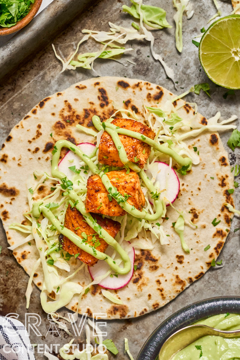 Air Fryer Chipotle Salmon Tacos with Avocado Crema