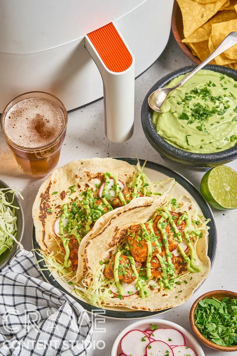 Air Fryer Chipotle Salmon Tacos with Avocado Crema